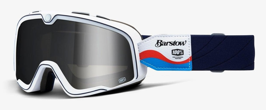 100% Barstow Lucien Brille mit weissem Rahmen, silber verspiegelter Scheibe und dunkelblauem Band mit rot-blauen Details.
